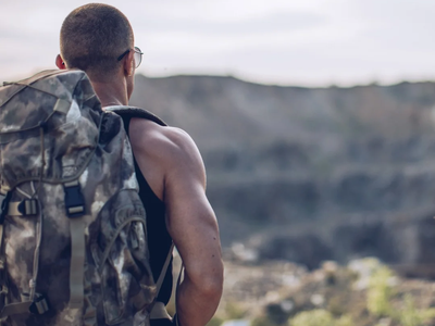 Man training on a mountain trail